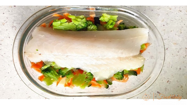 Риба запечена з овочами